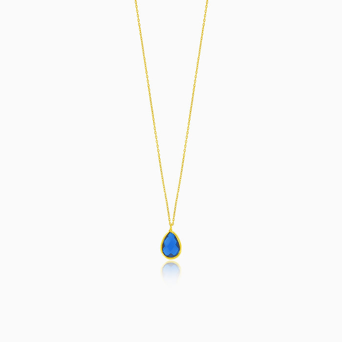 Collar fino de oro con forma de gota y zafiro sintético