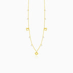 Gold necklace with hearts and zircons