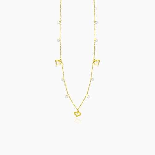 Gold necklace with hearts and zircons