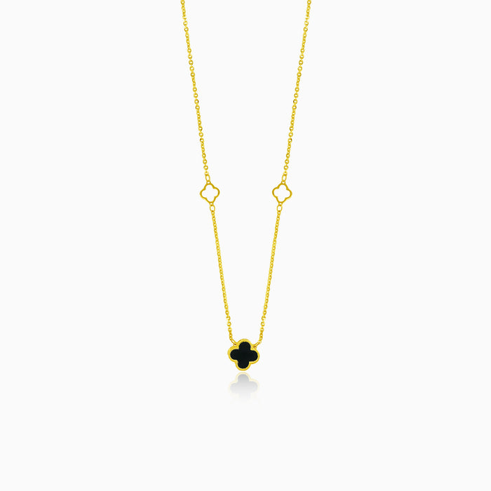 Collar de oro con trébol negro