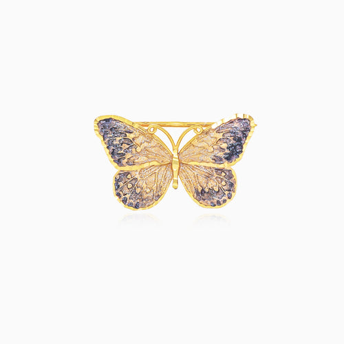 Gold butterfly brooch