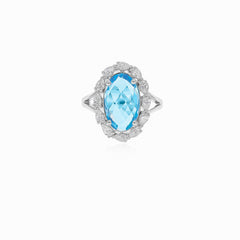 Halo silver blue topaz and cubic zirconia ring