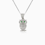 Silver pendant owl with cubic zirconia and synthetic emerald