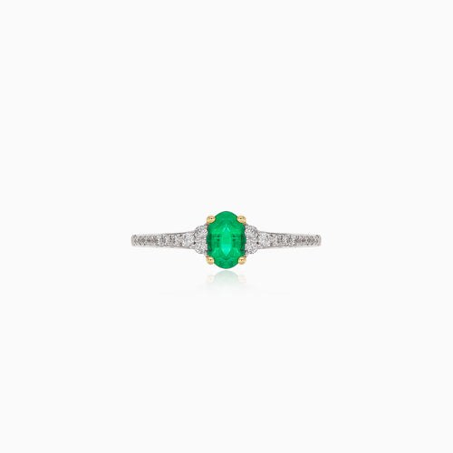 Yellow and white gold ring with diamonds and emerald