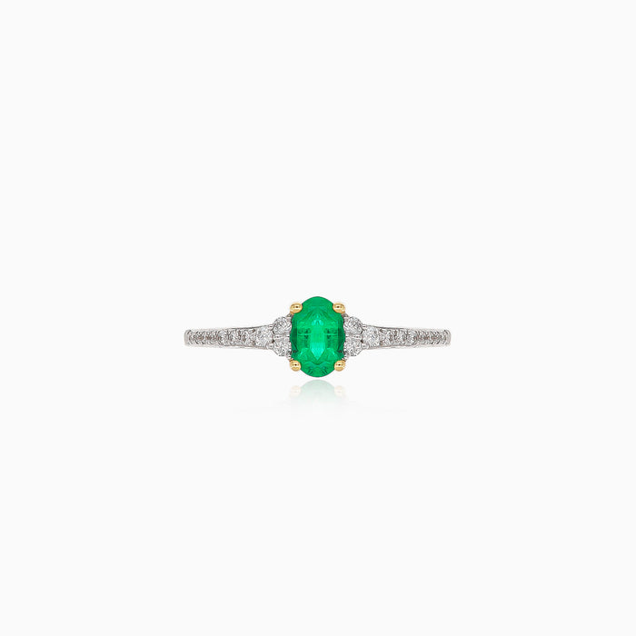 Bague en or jaune et blanc avec diamants et émeraude