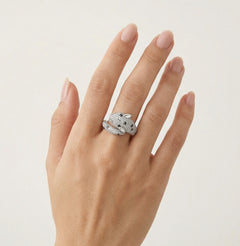 Whimsical panther inspired ring with diamond and blue sapphire