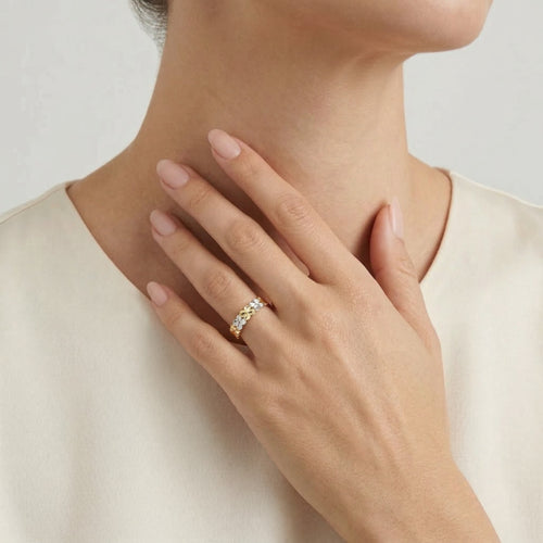 White and yellow gold band ring with high polish