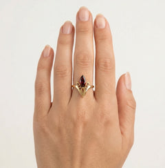 Majestic marquise garnet and gold beauty ring