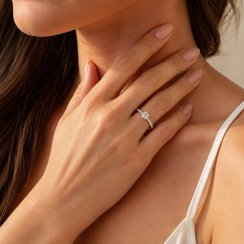 Elegant yellow gold diamond ring with pavé