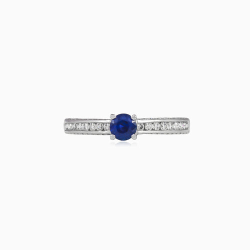 Zásnubní prsten s modrým safírem