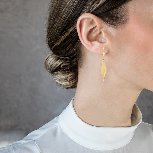 Leafy dangling gold earrings