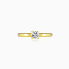 Thin four-prong solitaire gold ring