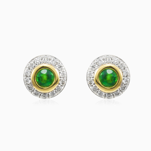Clous d’oreilles en or avec émeraude et diamant