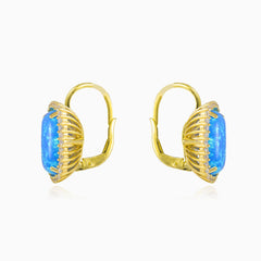 Massive cabochon blue opal gold earrings