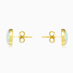 Round white opal gold earrings