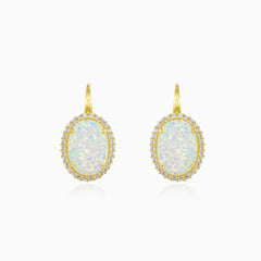 Massive oval white opal gold earrings