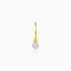 Yellow gold hoop with dangling pearl earring