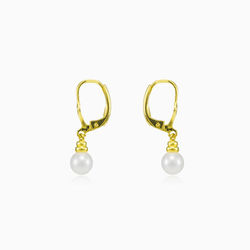 Dangling pearl gold earrings