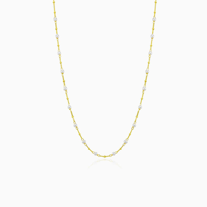 Minimalistische Halskette aus 14 Karat Gelbgold, verziert mit einer Perle.