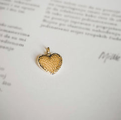 Double sided heart pendant