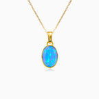 Simple blue opal gold pendant
