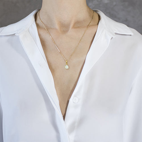 Pear white opal gold pendant