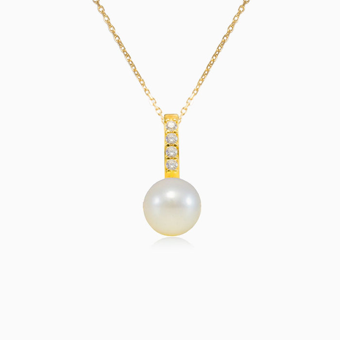 pendentif en or avec perle accentuée