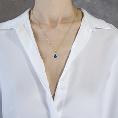 Pear-cut blue quartz gold pendant
