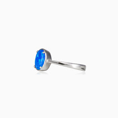 Tiny prong oval blue opal ring