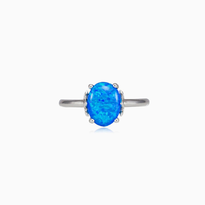 Blue opal in a crown ring