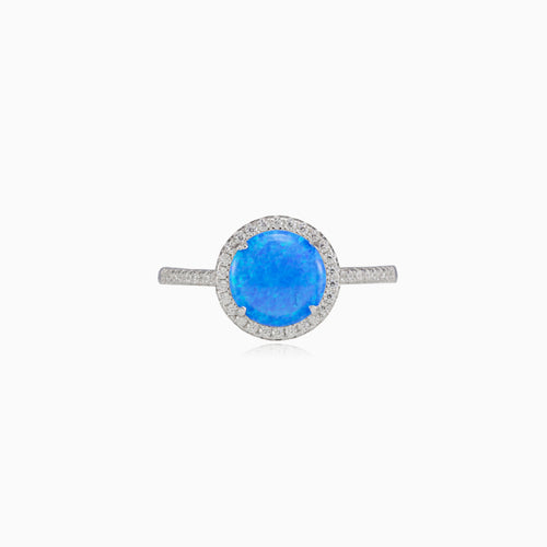 Královský prsten s kulatým modrým opálem