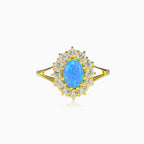 Královský zlatý prsten s modrým opálem