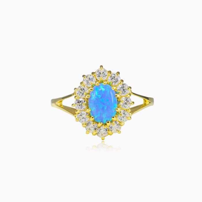 Bague royale en or avec opale bleue
