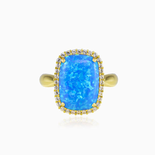 Masivní zlatý prsten s kabošonským modrým opálem