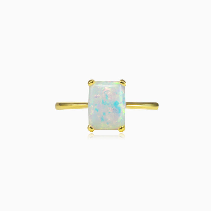 Anillo de oro con ópalo blanco rectangular