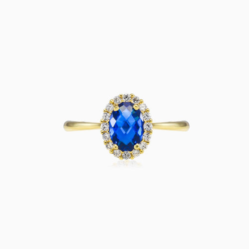 Oval blue quartz gold ring