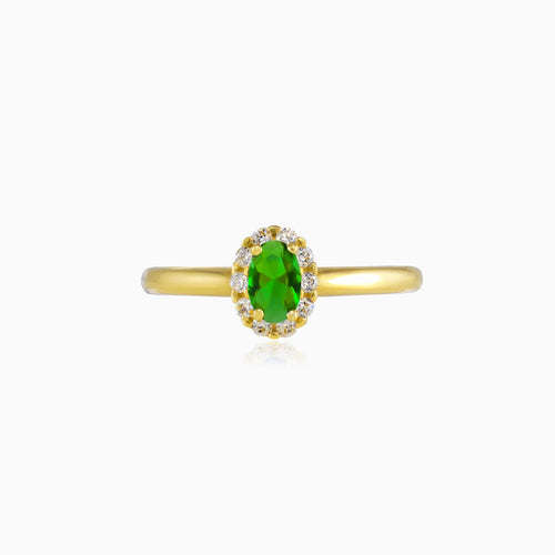 Odvážný zlatý prsten s oválným syntetickým smaragdem