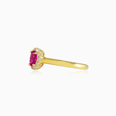 Bold oval rubellite gold ring