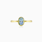 Bezel oval topaz gold ring