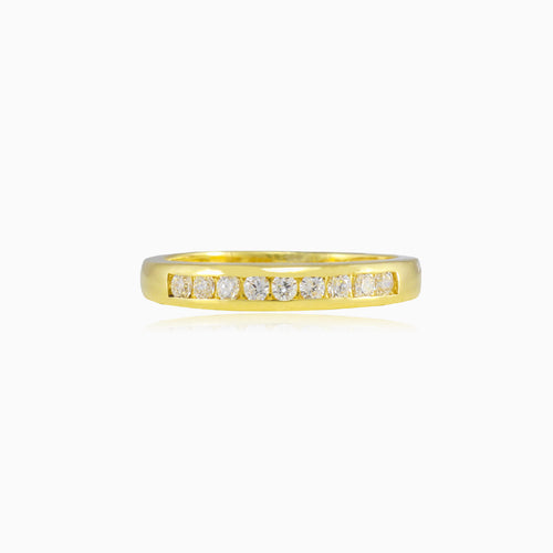 Thin channel-set cubic zirconia gold band