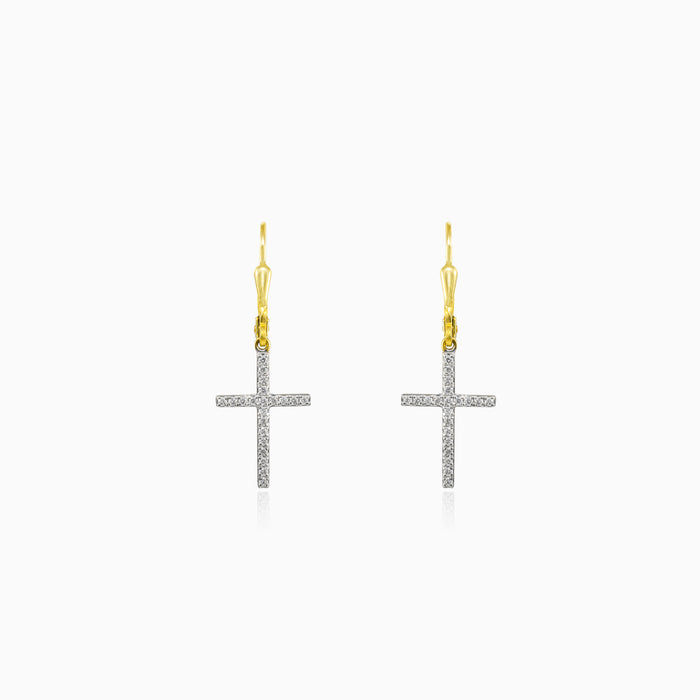 Dangling cross diamond earrings