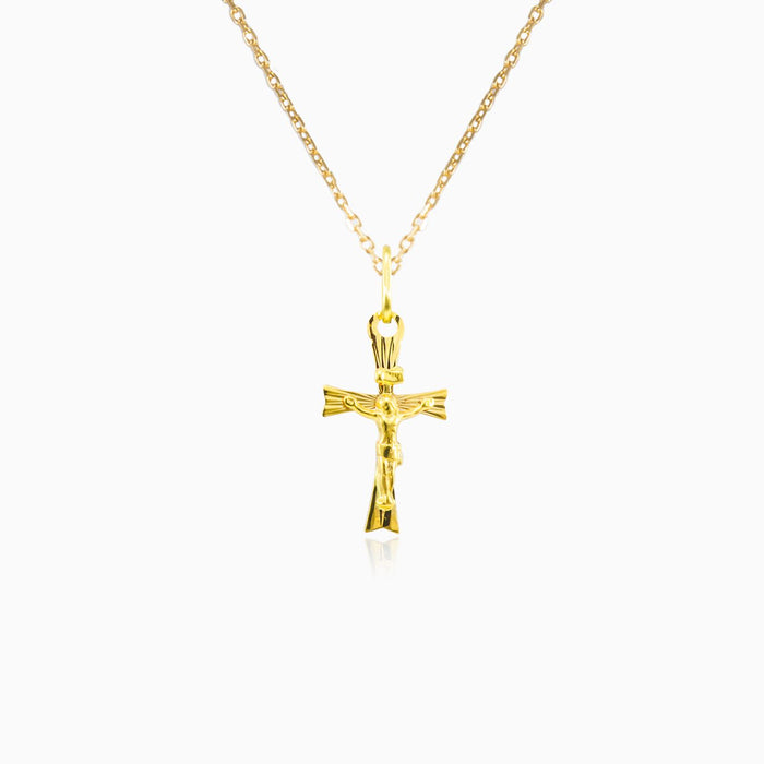 Gold cross pendant