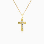 Lined gold cross